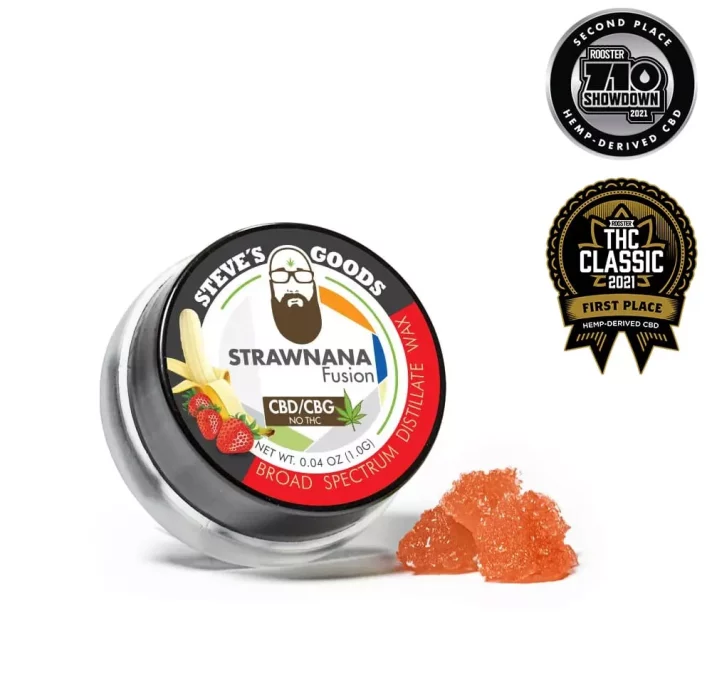 Strawnana CBD wax from Steve's Goods displayed wtith the full label and award-winning batches from the Rooster magazine